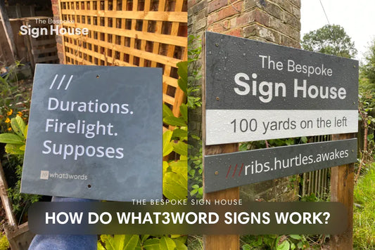 what3words address sign made of slate and fitted onto a brick wall