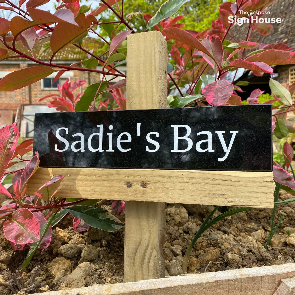 granite house sign with long address name